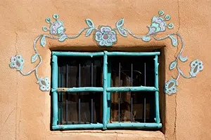 Adobe: Ornate Window - turquoise painted window mounted