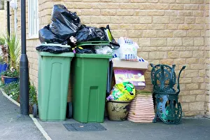 Overflowing: Overflowing Council waste bins and rubbish bags