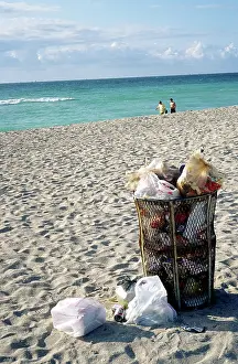 Cans: Overflowing Public Trash Can