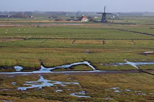 Mills: Overview of landscape with mills and farms