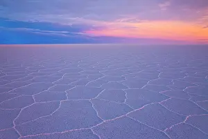 Salar: Overview of salt flat with salt hexagon patterns at sunset
