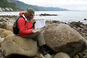 Palaeontologist: Paleontologist studying marine fossil deposits