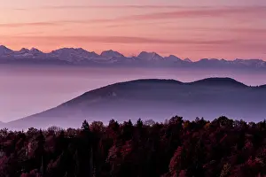 Solothurn: Panorama of foggy Swiss alps after sunset