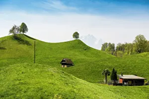 Huts: Panorama with huts and hills, Pilatus in the back