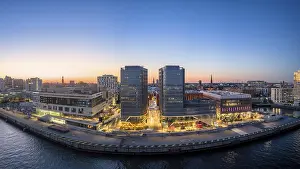 Aerials: Panoramic aerial view of the Westfield Hamburg Uberseequartier to the Blue Hours