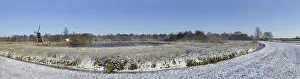 Ditch: Panoramic landscape with water windmill and a l