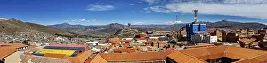 Cities: Panoramic view of a city with orange-coloured roofs