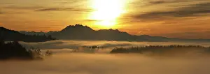 Filled: Panoramic view from Mount Pilatus across a sea of