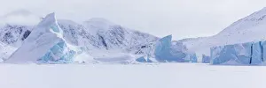 Nunavut: Panoramic view of snow-covered mountains seen from