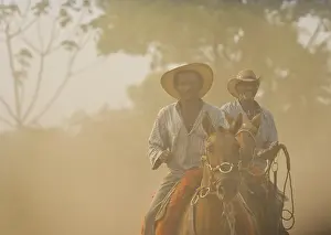 Smiles: Pantaneiros riding horses in Pantanal Brazil