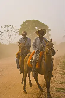 Smiles: Pantaneiros riding horses in Pantanal Brazil