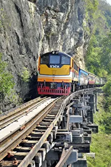 Burmese: Passenger train runs on wooden bridge, Thamkra Sae