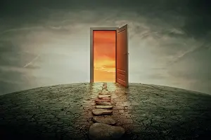 Opened: Pathway along a dry, cracked desert land, going