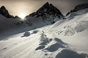 Lechtal: Peak of the Dremelspitze in winter with ski trail