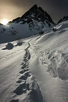 Lechtal: Peak of the Dremelspitze in winter with ski trail