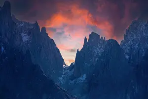 Adige: The peaks of the Sassolungo group in the sunset