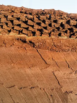 Warmth: Peat cutting on Shetland, Scotland. the