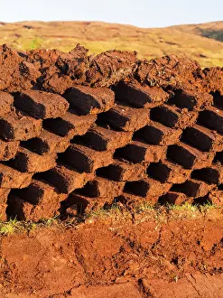 Warmth: Peat cutting on Shetland, Scotland. the