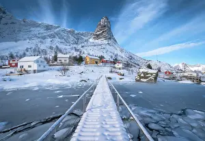Residential: Pedestrian bridge over frozen fjord, in the back