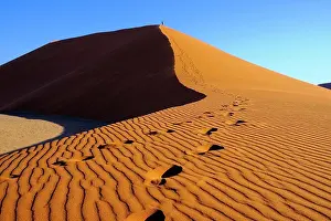 Pyramid: People climb the Dune 45, Sossusvlei, Namibia, Africa