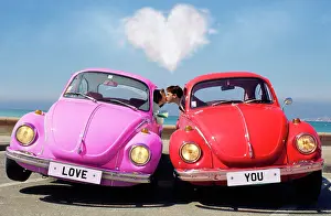 Married: People - man & woman kissing in beetle cars. just