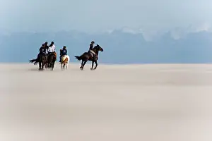 Vlieland: People riding horseback on beach