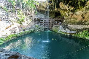 Limestone: People swimming in Cenote Zaci carboniferous lim