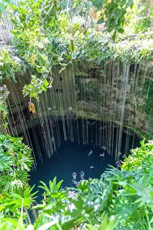 Limestone: People swimming in limestone sinkhole pool, Ceno