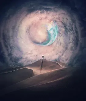 Imagination: Person silhouette on the top of a dune in a desert