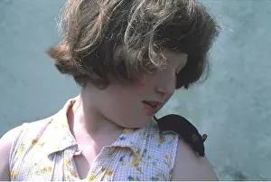 Owner: Pet Black MOUSE - on child's shoulder