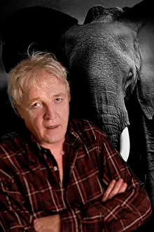 Photographers: Photographer Jean-Michel Labat with Elephant background