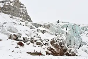 Infront: Photographer taking images infront of Glacier