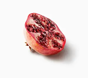 Aromatherapy: Pomegranate, Punica granatum, Side view of one fruit