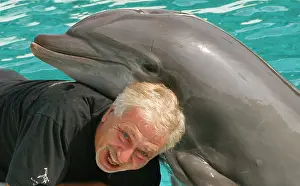 Portait: Portait of photographer Leandro A. Stanzani with Dolphin
