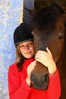 Wheedling: Portrait of a young girl with her Horse