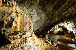 Stalactite: Postojna Cave, 22 km long and dug by the Pivka river
