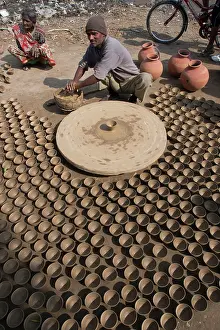 Handicrafts: Potter working at roadside