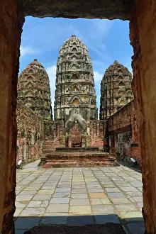 Temples: Three Prangs seen through a doorway, Wat Si Sawai Temple, Su