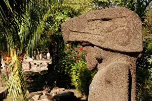 Sculptures: Pre-Columbian stone statue in front of the church