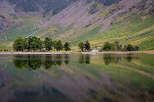 Features: Pre-dawn reflections on Buttermere Lake, Cumbria