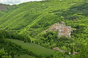 Surrounded: Preci surrounded by woodland Monti Sibillini, Italy