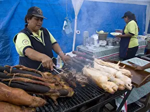 Preparing: Preparing grilled Domestic Guinea Pigs Quito Ecuador
