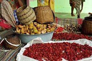 Agricultre: Processing Nutmeg - baskets and red coloured mace