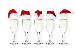 Alcoholic: Prosecco / Champagne glasses with Christmas hats on