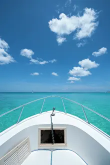 Breaks: Prow of a pleasure boat at anchor in Grand Case