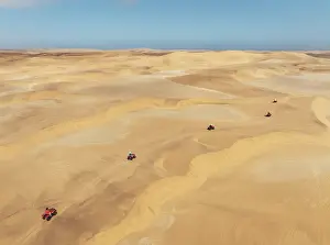 Dune: Quad bikes in the dunes of the Namib Desert in the vicinity of the coastal town of Swakopmund