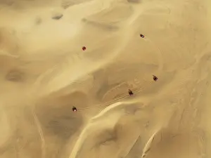 Dune: Quad bikes in the dunes of the Namib Desert in the vicinity of the coastal town of Swakopmund