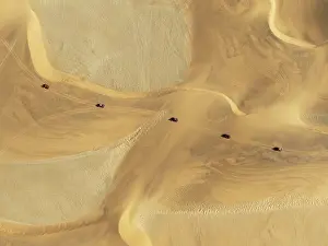 Dune: Quad bikes in the dunes of the Namib Desert in the vicinity of the coastal town of Swakopmund