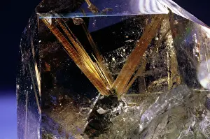 Oxide: Quartz enclosing rutile (rutilated quartz)