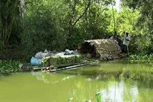Canoes: Raft used for transporting produce to town on river